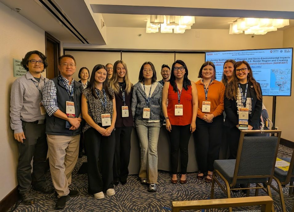 group of faculty and students at a conference